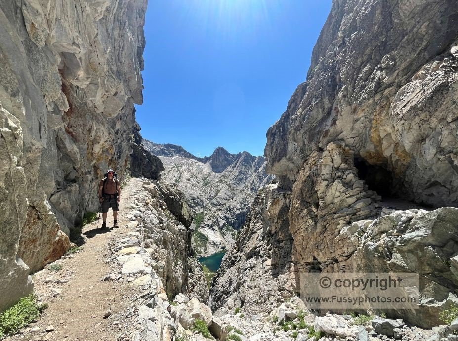 Standing by the tunnel carved high above Hamilton Lakes—a bucket‑list moment on the High Sierra Trail.