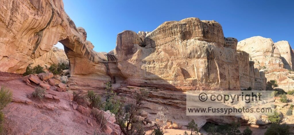The Hickman Bridge Trail rewards hikers with a massive 133‑foot natural stone arch in Capitol Reef National Park