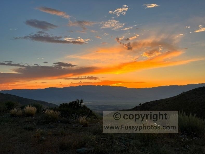 Dawn light over Grays Meadow, with the campground visible in the valley below.