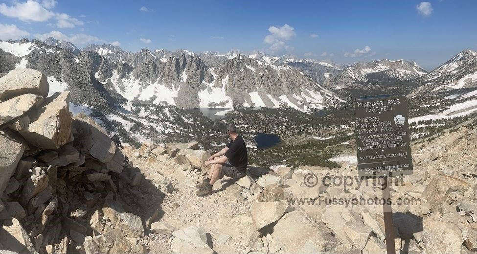Entering Kings Canyon National Park at Kearsarge Pass, marked by the boundary sign and high‑alpine terrain.