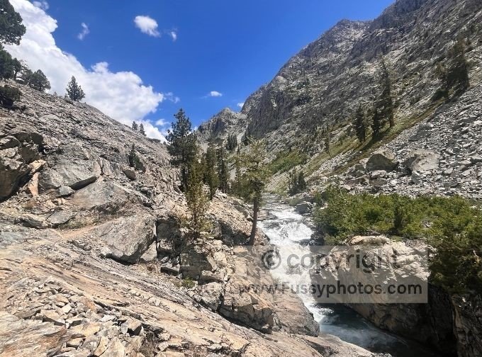 Waterfalls pour into the South Fork San Joaquin River, echoing through the canyon as we hiked the John Muir Trail.