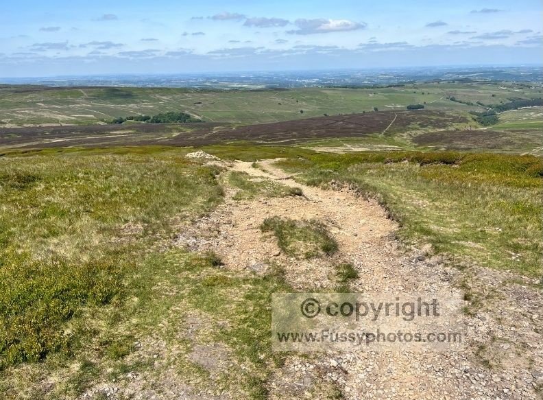 Moorland descent from Black Hill on the Pennine Way, leading towards the A635 crossing at Wessenden Head.