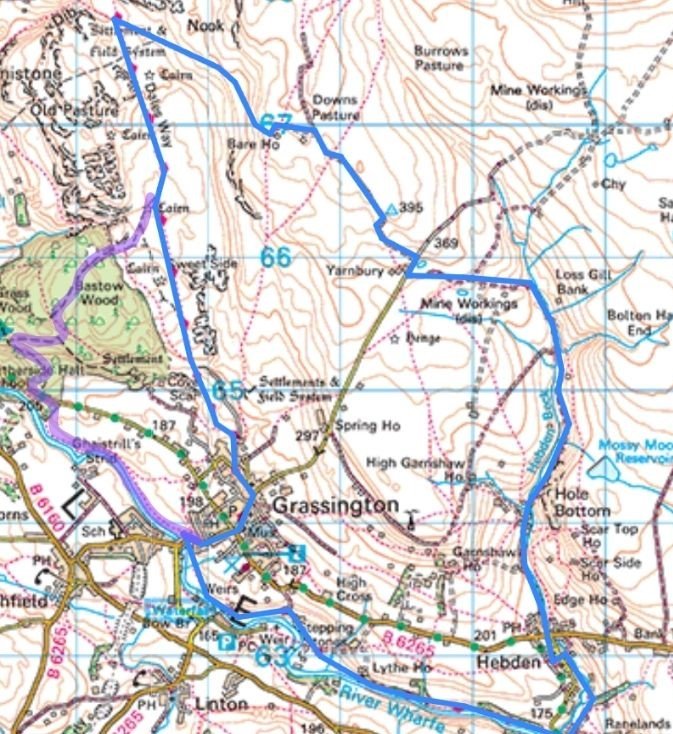 **Alt text:**
Map showing the Grassington Circular walk with the 11‑mile river‑path finish, including the main route in blue and the riverside detour in purple.