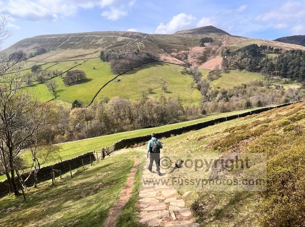 Rocky, pebbled path descending steeply towards Edale near Golden Clough, with the valley below.