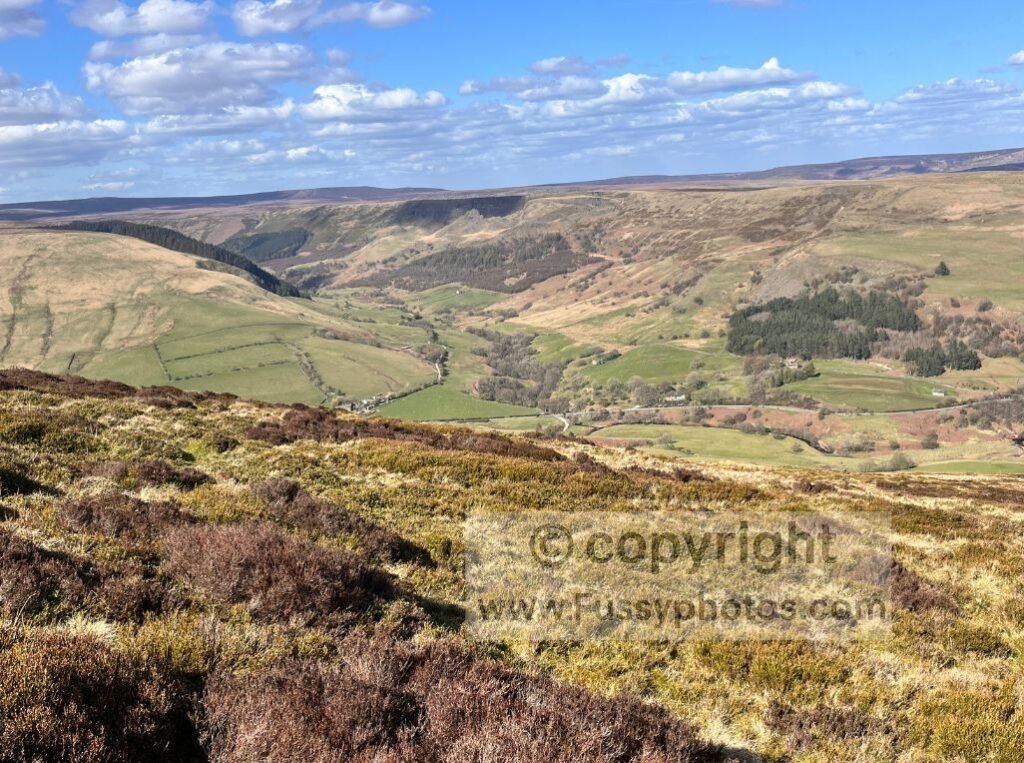 Telephoto view into Ashop Valley from the ascent, showing Upper Ashop in bright conditions.