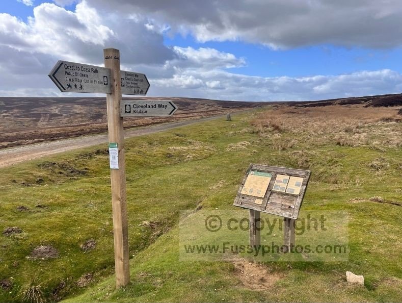 Moorland track at Bloworth Crossing on the Coast to Coast, a remote junction marking the commitment to a long day across the high ground.
