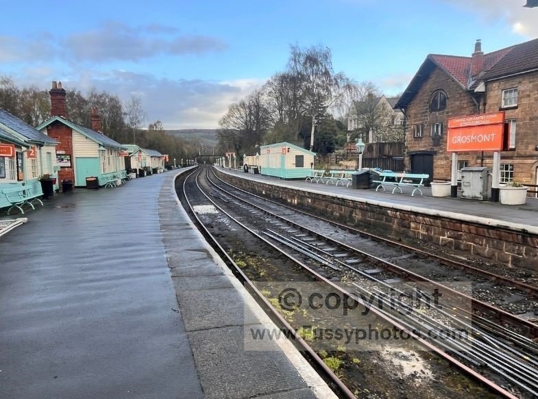 View of Grosmont railway station, empty of steam trains, reached after the 1:3 descent into the village on the Coast to Coast route.