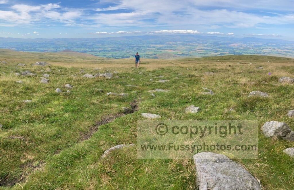 View looking southwest from the climb up Knock Fell, with rising moorland and wide, open scenery.