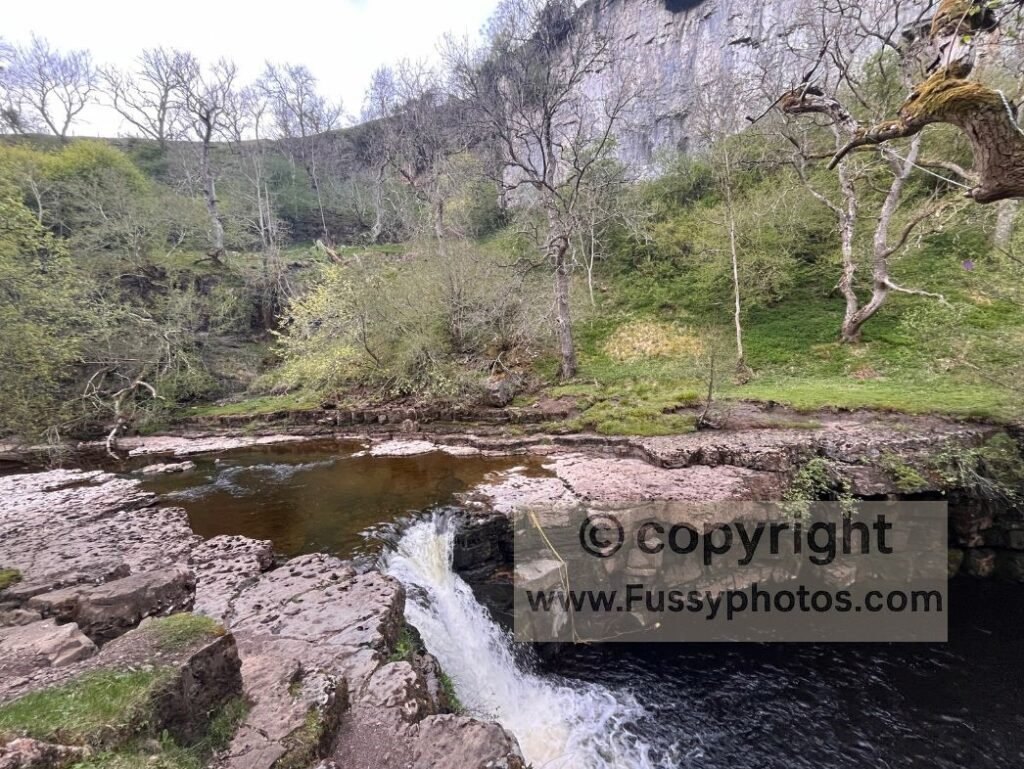 Kisdon Force waterfall with deep plunge pool, located a few minutes west of the Pennine Way near Keld.