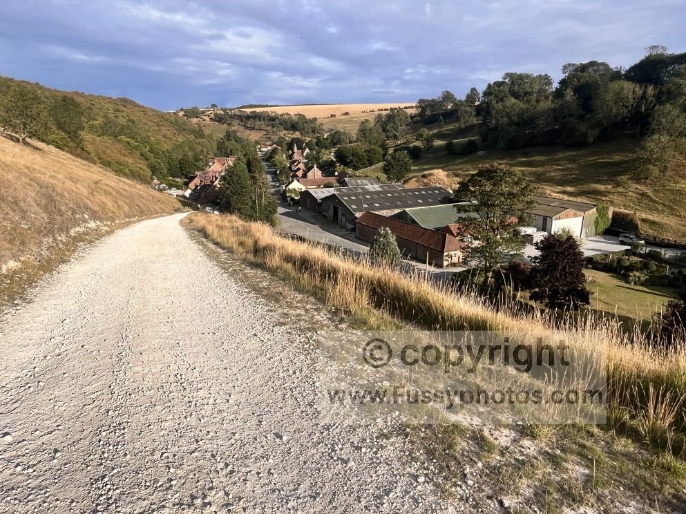 High viewpoint above Thixendale looking east, showing classic Wolds Way dry‑valley scenery in a section where no accommodation is available.