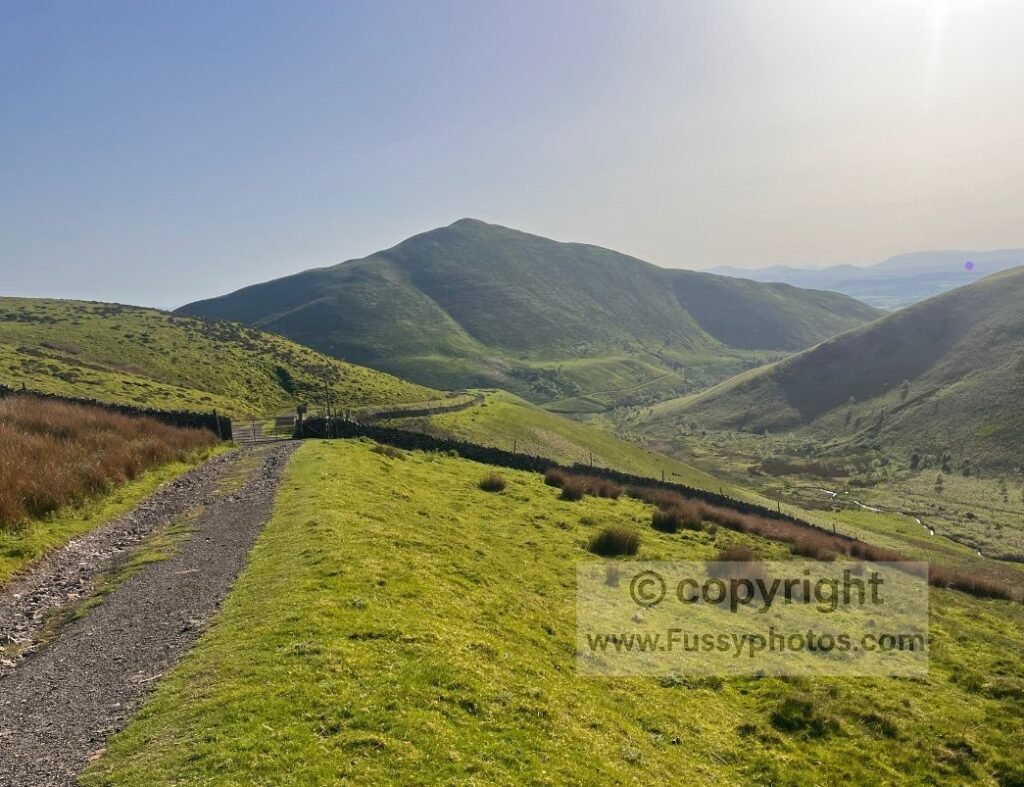 Dufton Pike downhill view alt — Photo looking back downhill at Dufton Pike, with Knock Pike concealed by the hills to the right on the approach to Great Rundale.