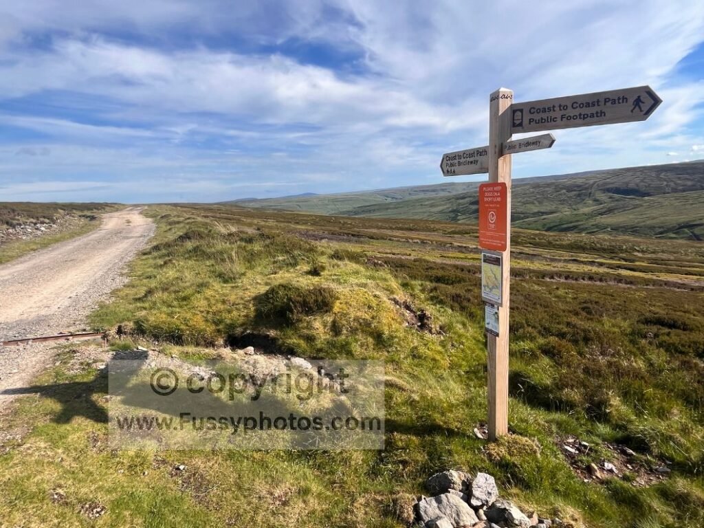 Coast to Coast trail sign — lone waymarker at a junction on the Coast to Coast Path.