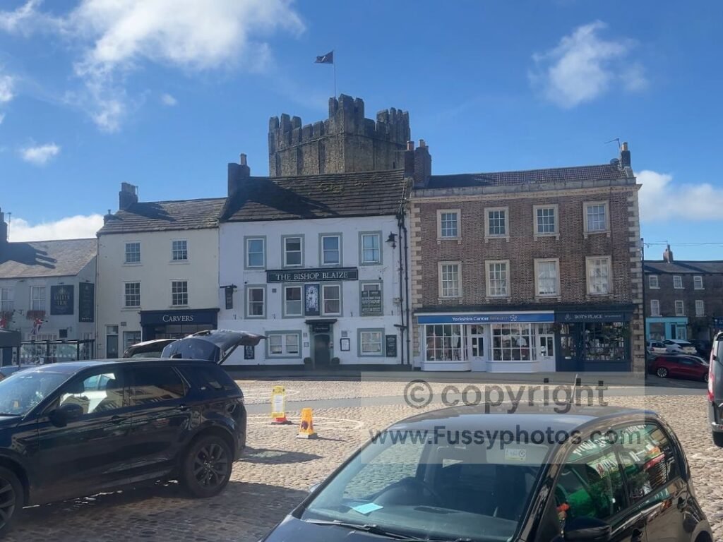 Richmond town centre on the Coast to Coast, showing easy access to shops and food.