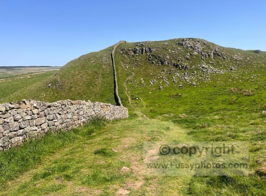 Section of Hadrian’s Wall before Winshields, running along the rocky escarpment.
