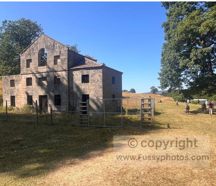 Paine’s Mill on the Chatsworth Estate, an 18th‑century ornamental mill by James Paine, maintained as a ruin after storm damage in 1962.