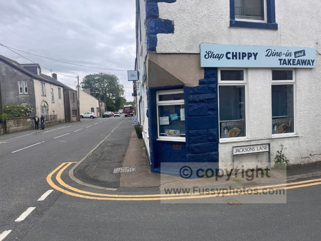Main road in Shap with the closed Shap Chippy, taken after arriving early to find both the pub and fish and chip shop shut.