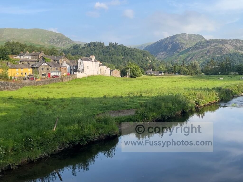 View of Patterdale surrounded by Lakeland fells, marking the end of the first section in the Coast to Coast five‑section itinerary.